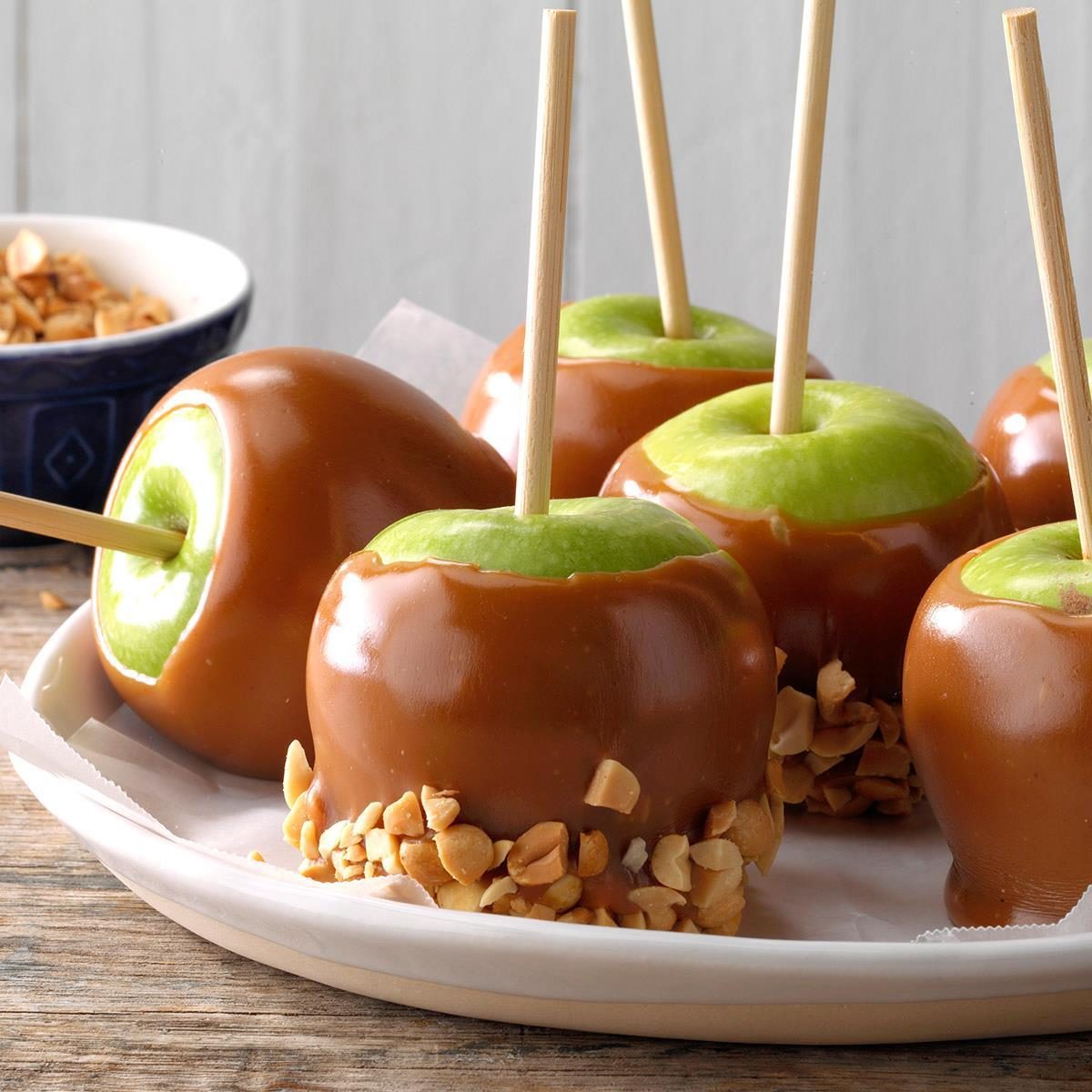 Caramel Apples with sticks through the center